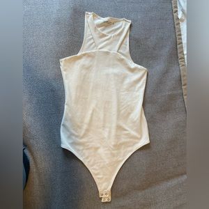 Cute cream/white colored bodysuit